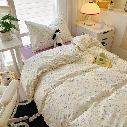 Cream-colored floral duvet set with pastel patterns in decorbites cartoon style cotton bedding sets for cozy bedrooms