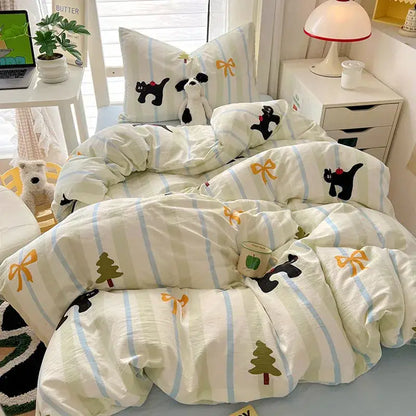 Cream-colored cotton bedding sets with light blue stripes and cartoon style cotton cat print for bedroom decorbites