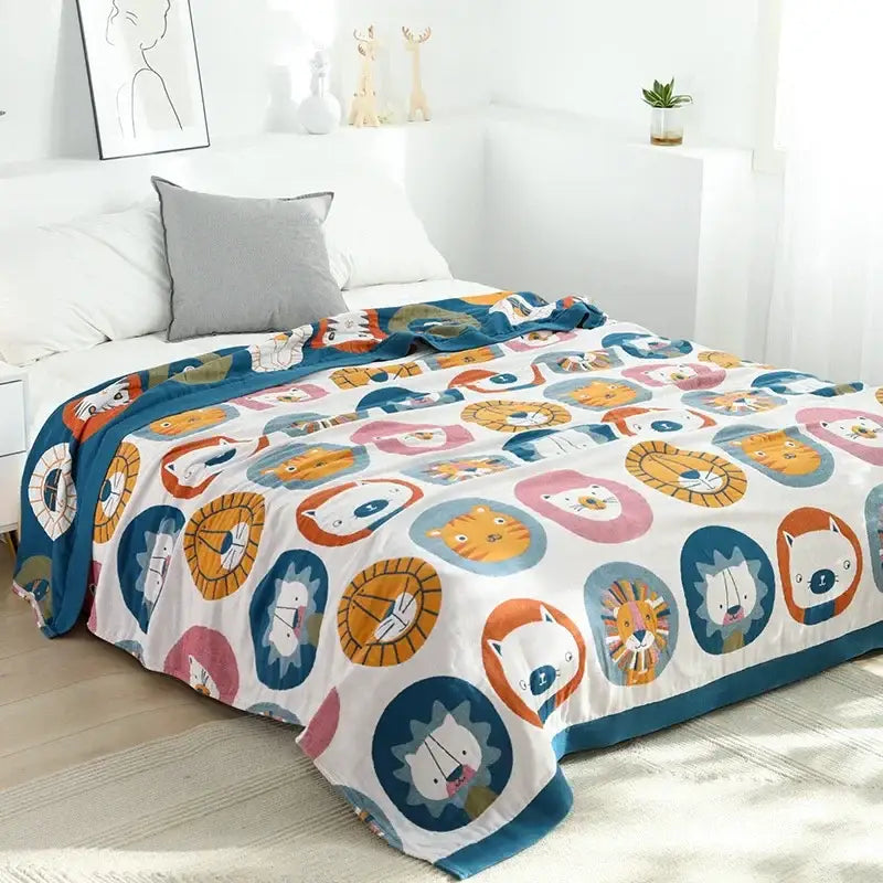 A cozy white decorbites cartoon throw blanket with playful orange blue pink and teal lions and tigers in circles