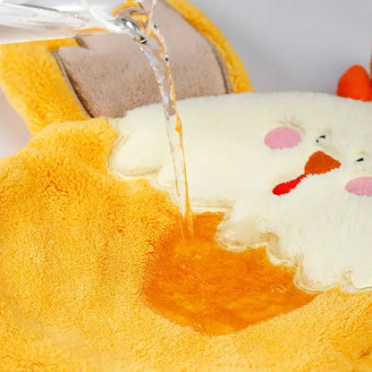 Yellow plush chick-shaped hand towel with pink cheeks and orange beak made of decorbites coral velvet for kitchen decor