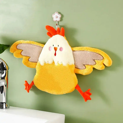 A plush yellow and white chicken coral velvet hand towel holder with orange feet beak and gray wings decorbites coral velvet