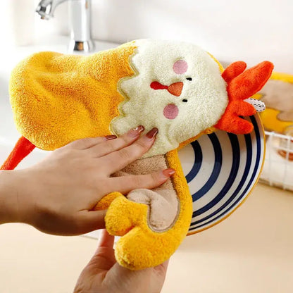 Yellow plush chicken-shaped hand towel with embroidered face and orange beak made of decorbites coral velvet cartoon fabric