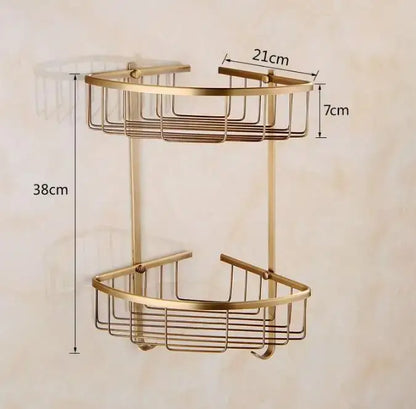 Gold-toned double-tier corner shower caddy with wire mesh design and curved edges in carved antique bronze brass decorbites set