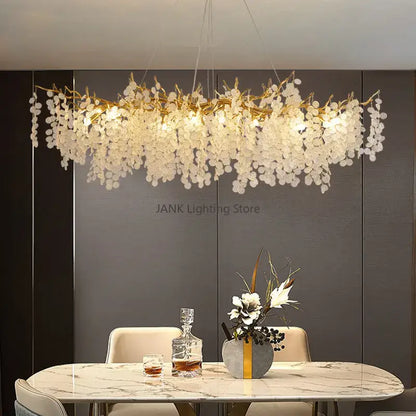 A cascading gold circular crystal chandelier with golden branch design and clear petal-shaped glass for living room decorbites circular crystal decor