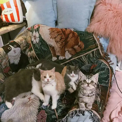 A dark green decoarbites cat sunflower knitted sofa cover featuring embroidered cats and floral patterns for living room decor