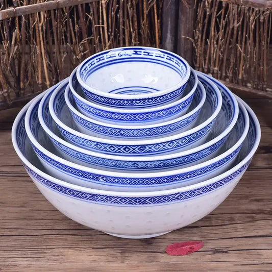 Set of five nested ceramic dragon print bowls in blue and white featuring traditional geometric patterns for dining decorbites ceramic dragon