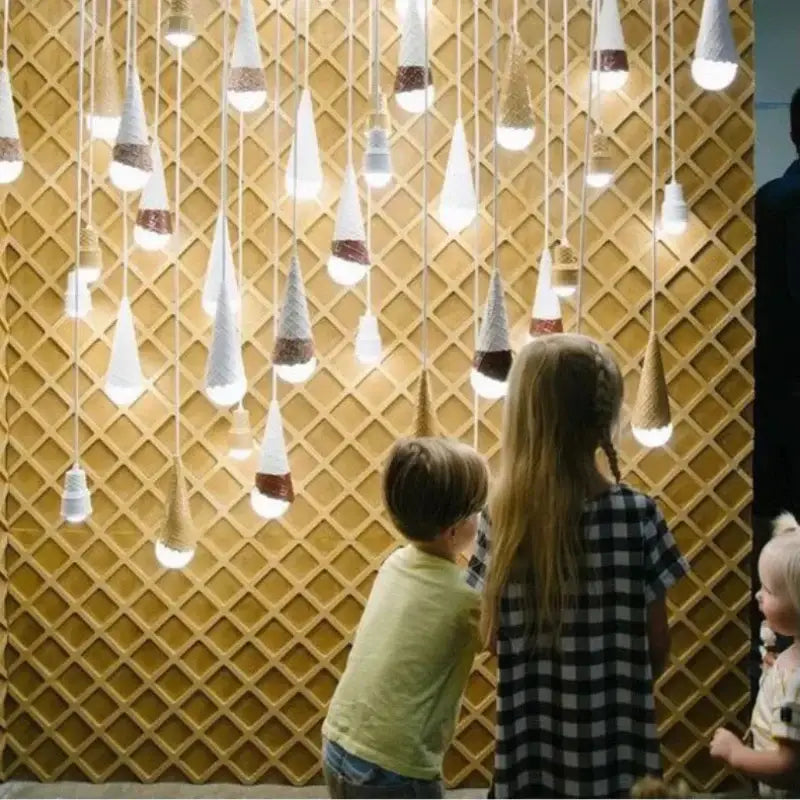Ceramic ice cream pendant light with white and brown textured surfaces and led bulb for nursery with wrought iron fixture
