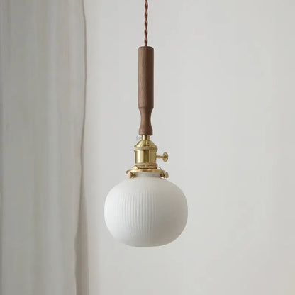 White ribbed glass pendant light with brass fixture and wooden handle from decorbites ceramic walnut copper collection