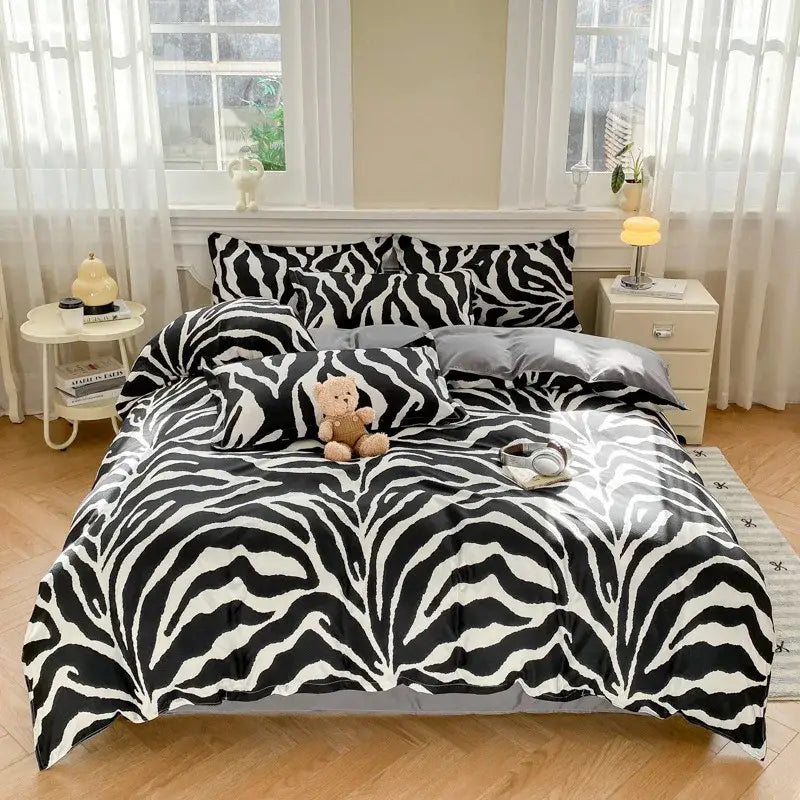 Black and white zebra print satin duvet cover set with bold glossy stripes for stylish bedroom bedding cover set