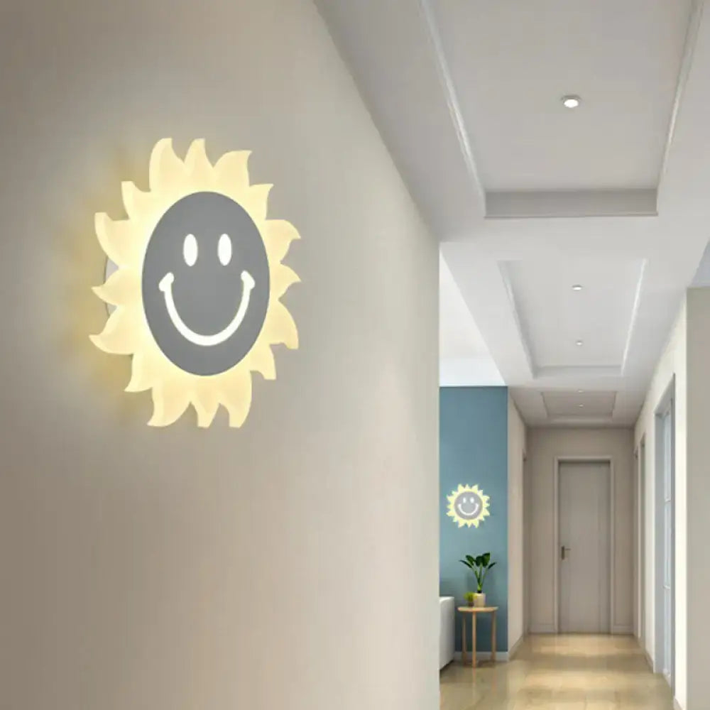 Cheerful white smiling sun led wall sconce glowing with illuminated face design for bedroom lighting