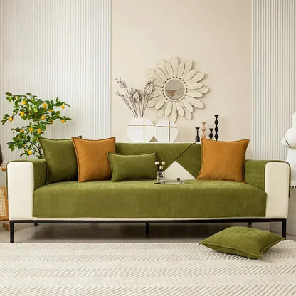 Olive green velvet chenille textured non-slip sofa cover with white armrests and black metal legs for living room sofa cushion