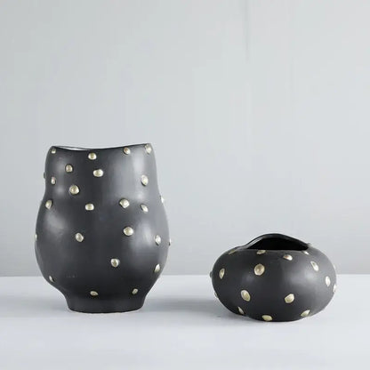 Chic black resin flower pot with gold accent featuring black ceramic vases with silver metallic dots for decorbites black resin decor