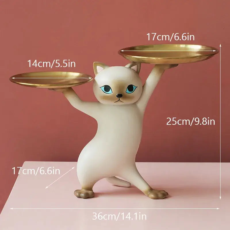 Chic cream and gold decorbites cat resin tray featuring a ceramic cat figurine with blue eyes holding gold trays