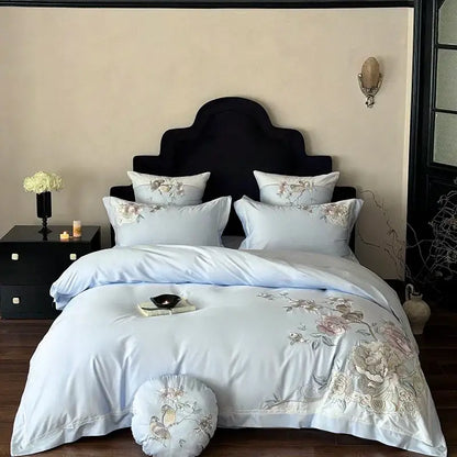 Light blue satin bedding set with delicate chinese flowers bird embroidery in soft pastel tones for bedroom use
