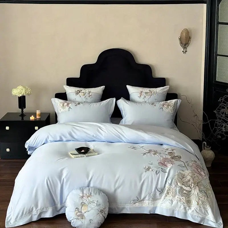 Light blue satin bedding set with delicate chinese flowers bird embroidery in soft pastel tones for bedroom use
