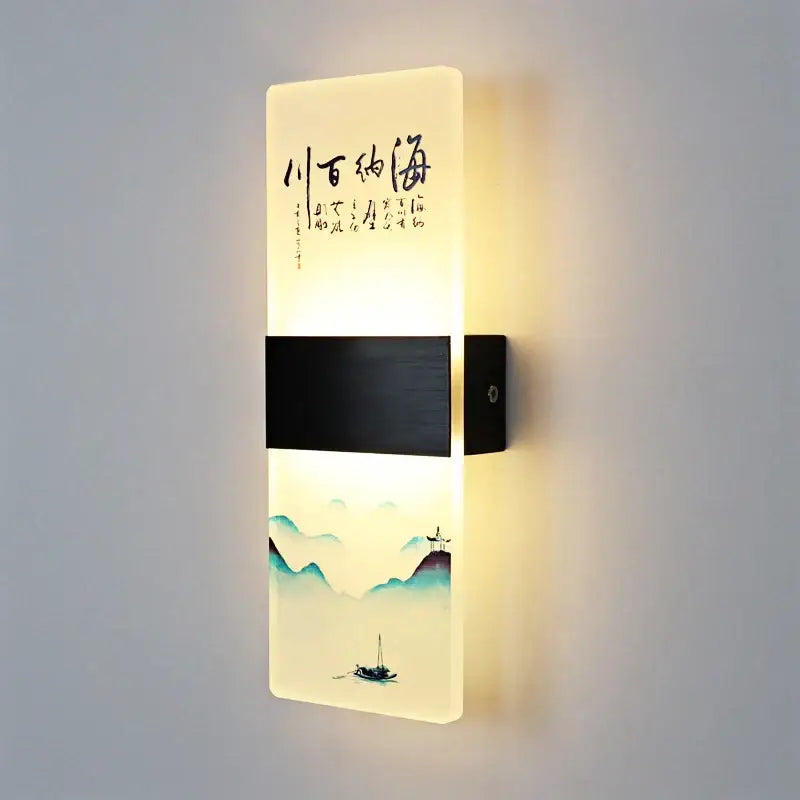 A wall lamp with a translucent acrylic shade featuring Chinese ink landscape art and calligraphy for bedroom decor
