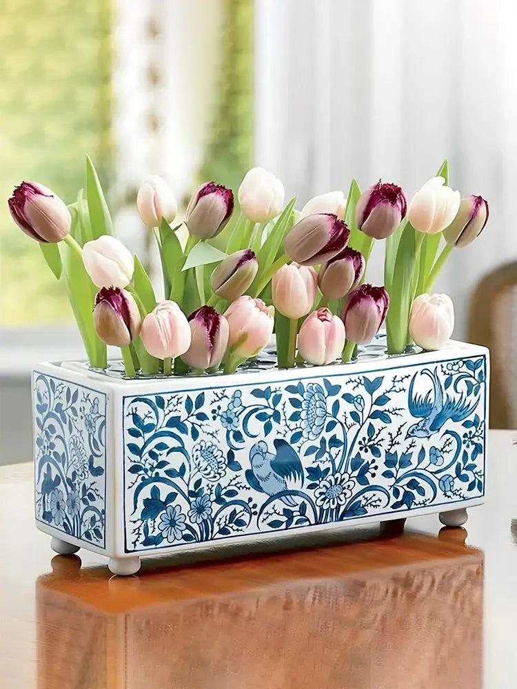 Blue and white ceramic flowerpot vase with intricate floral bird designs holding pink purple tulips for living room decorbites blue white white porcelain
