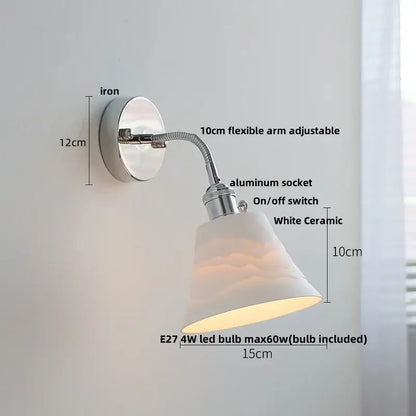 A chrome wall lamp with adjustable arm and white ceramic shade designed for bedroom decorbites adjustable arm use