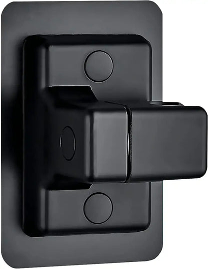 Black matte-finish metal latch with rectangular base and circular indentations for shower head holder adjustment