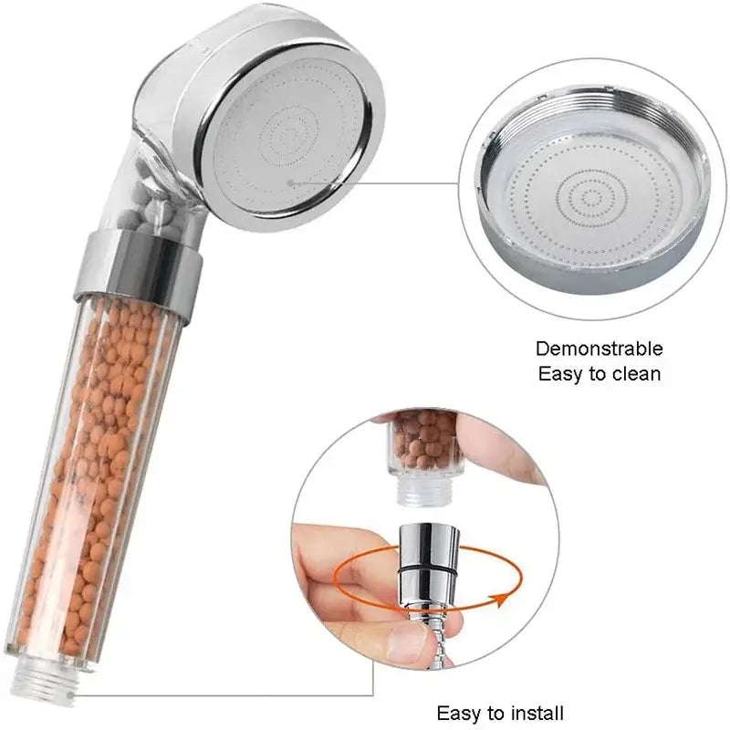 Chrome anion spa shower head with transparent cylinder and orange ceramic filtration beads for high pressure water saving