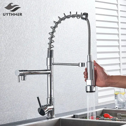 Chrome decorbites kitchen faucet with pull down spring hose featuring a flexible coiled chrome finished spray head