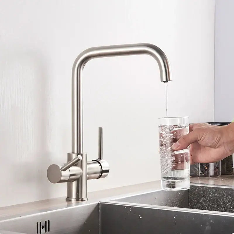Modern chrome dual spout filter faucet with 360 rotation and sleek stainless steel curved spout single handle control