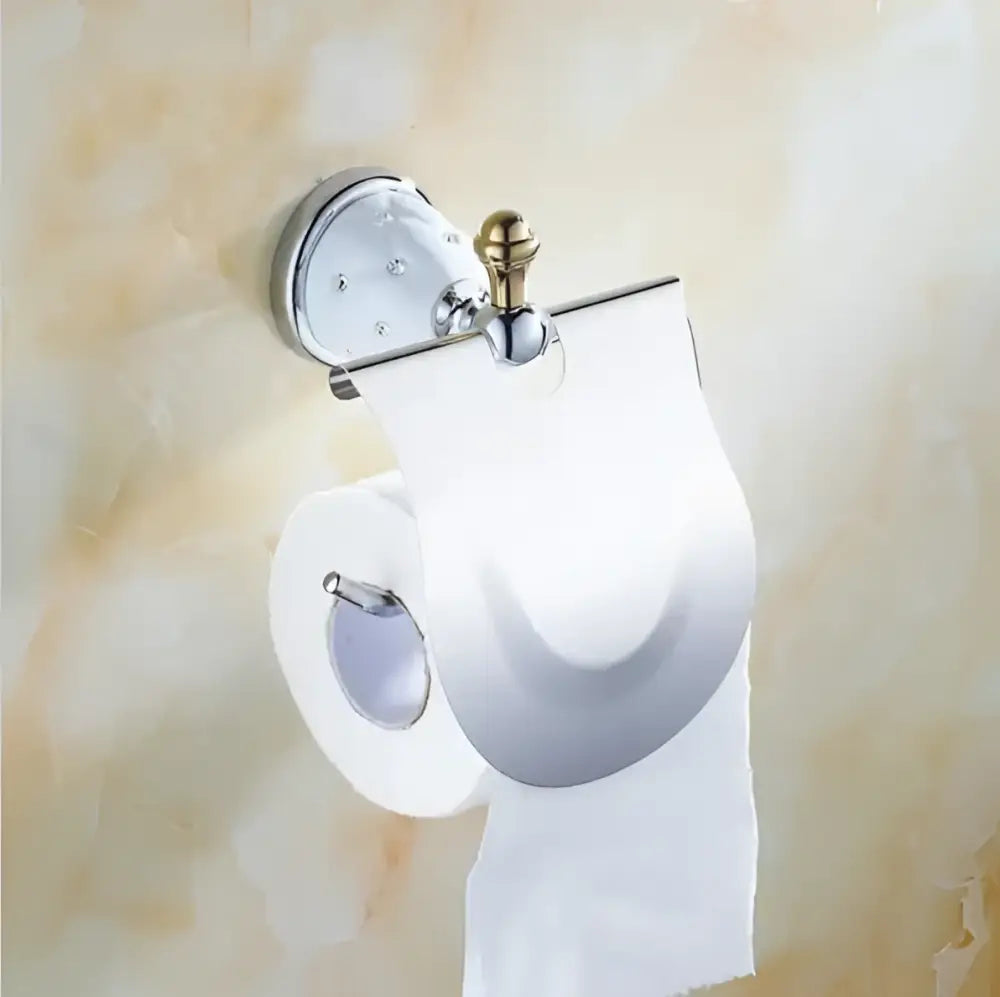 Chrome finished toilet paper holder with gold toned knob and clear acrylic cover from decorbites bathroom hardware set