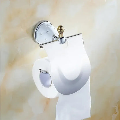 Chrome finished toilet paper holder with gold toned knob and clear acrylic cover from decorbites bathroom hardware set