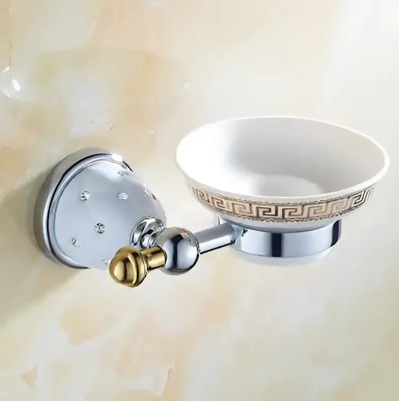 Chrome finished wall-mounted soap dish with white ceramic bowl and gold greek key pattern in decorbites bathroom hardware set