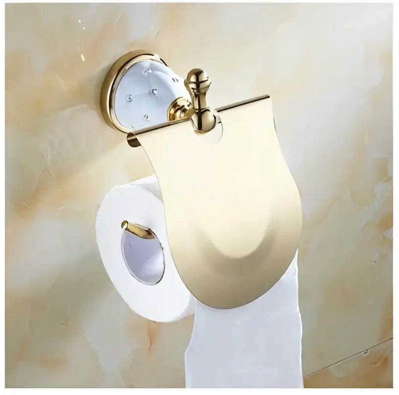 Gold-toned toilet paper holder with crystal accent and sleek design from decorbites bathroom hardware set