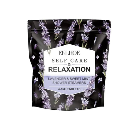 Black pouch with lavender and sweet mint shower steamers beside a chrome high pressure water saving shower head with filter