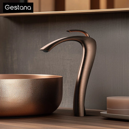 Gestana bronze-finished waterfall faucet with sleek curved design single hole brass housing material for cold water control
