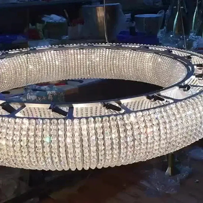 Chrome round crystal chandelier living room pendant light featuring a large circular design with clear crystal beads