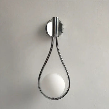 Chrome teardrop wall sconce with frosted white glass ball and chrome finish for bedroom decorbites black glass style