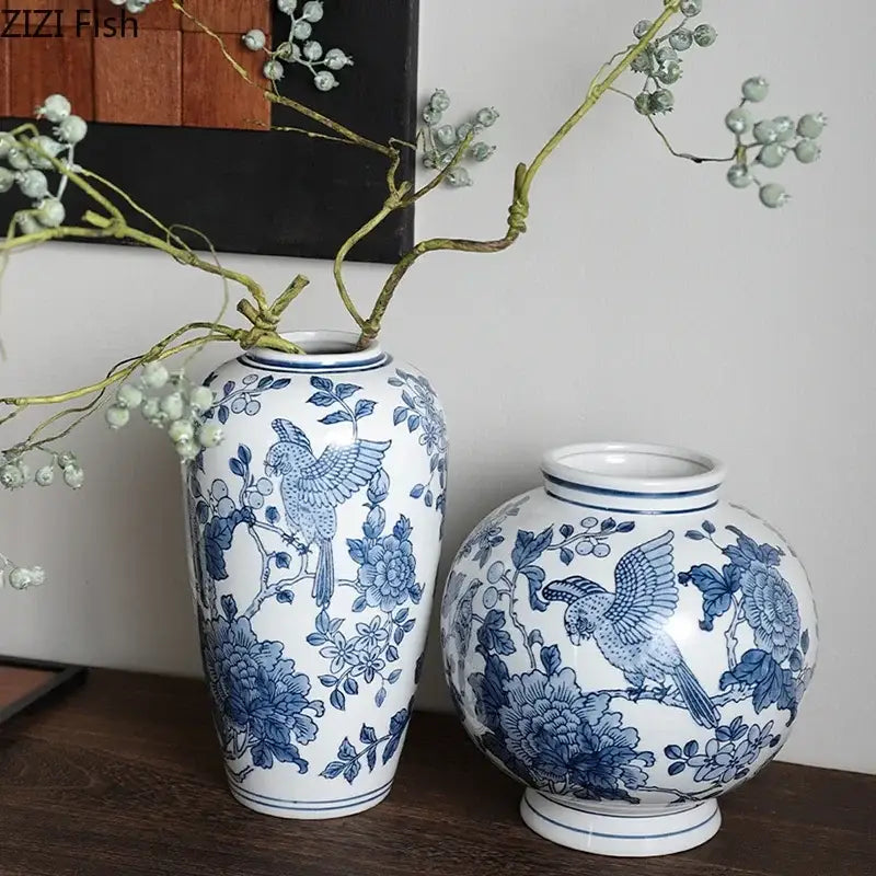 Two blue porcelain vases with bird and floral motifs in traditional chinese style for decorbites blue porcelain decor
