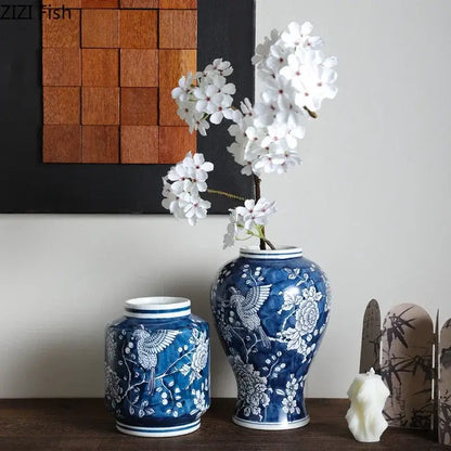 Classic blue porcelain vase with intricate bird and floral patterns for living room decor by decorbites blue porcelain