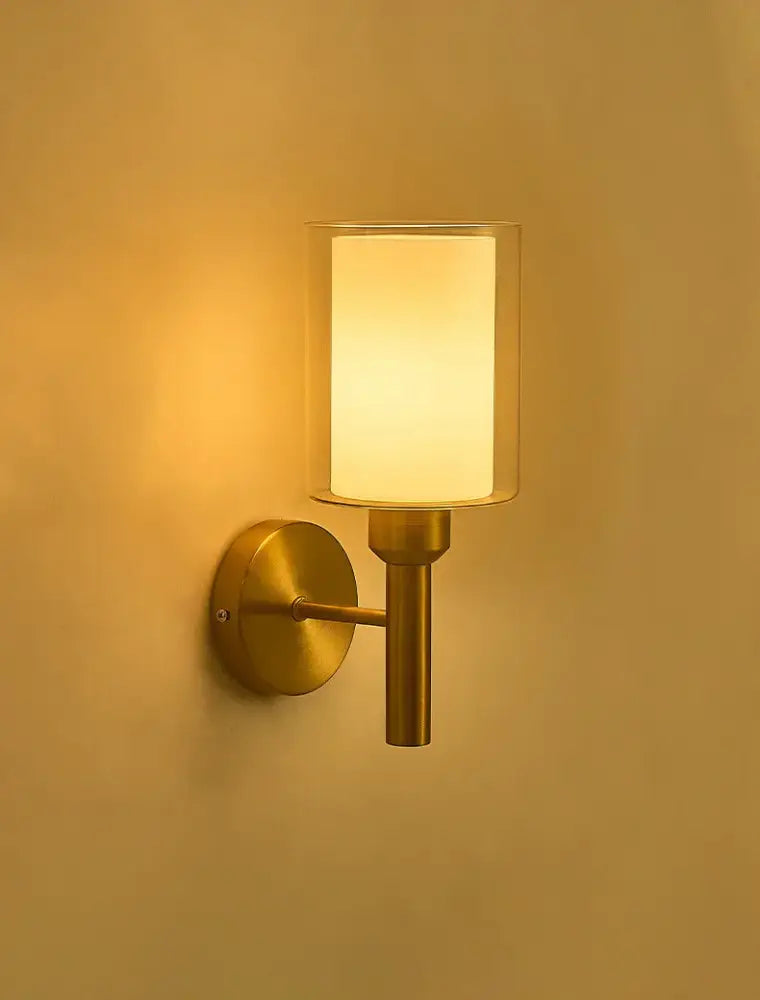 Classic brass glass wall sconce with frosted cylindrical shade for bedroom decorbites brass glass wall lighting