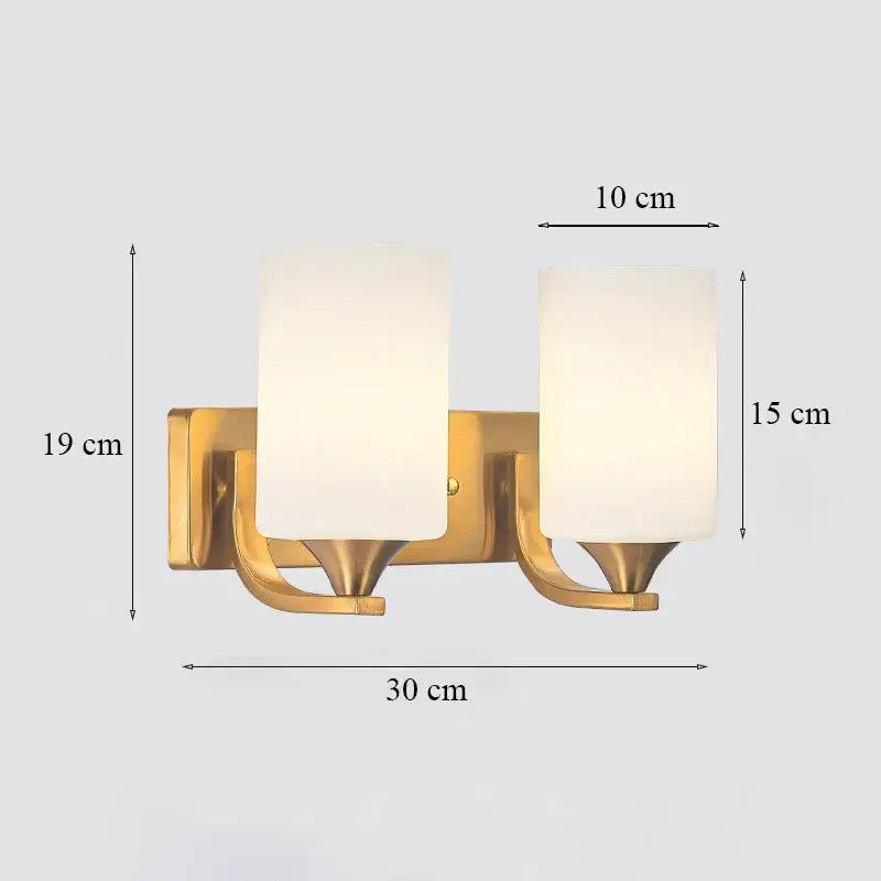 Classic brass glass wall sconce with gold-toned finish and two frosted glass shades for bedroom decorbites brass glass wall