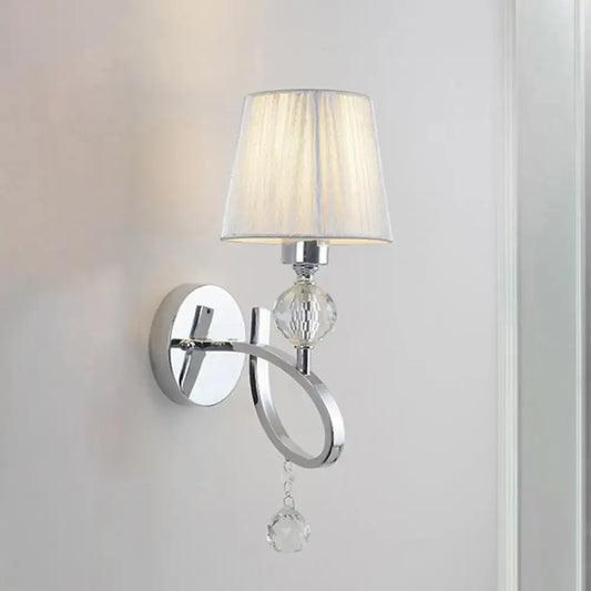 Classic chrome crystal drop wall lamp with faceted crystal accent and off-white pleated lampshade for bedroom