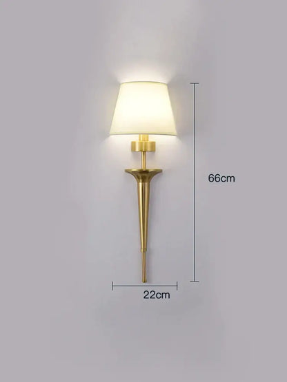 Classic gold fluted wall lamp with tapered stem and soft white fabric shade perfect for bedroom decorbites copper wall lamp