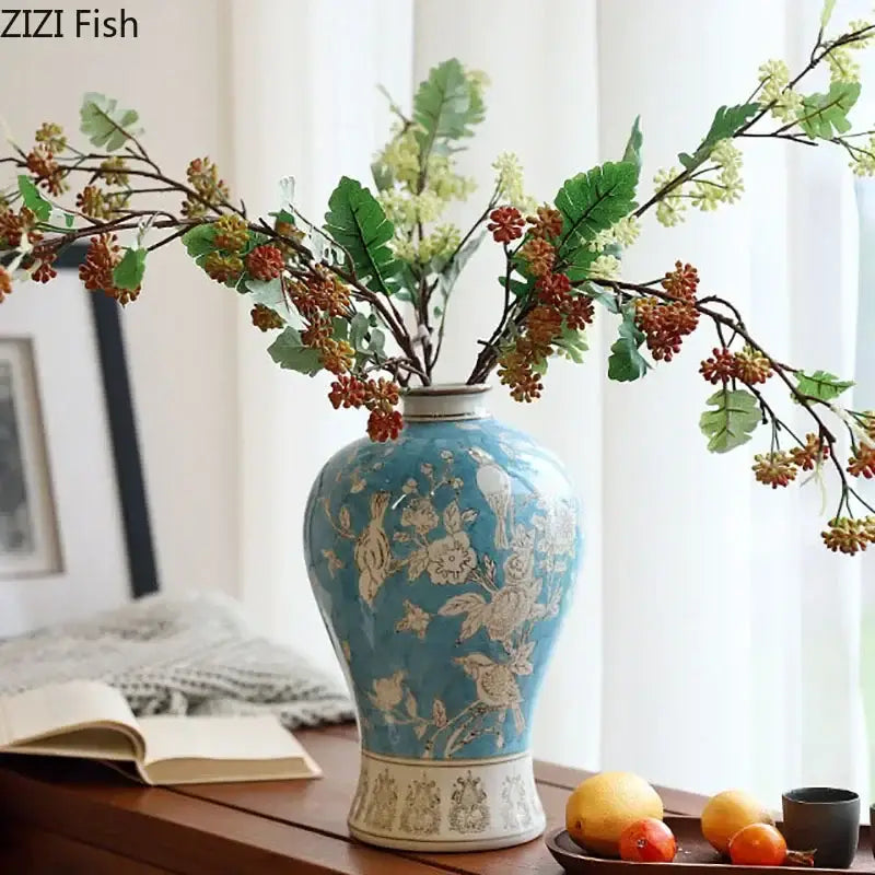 A classical blue and white porcelain vase with intricate floral and bird patterns for living room decorbites decor