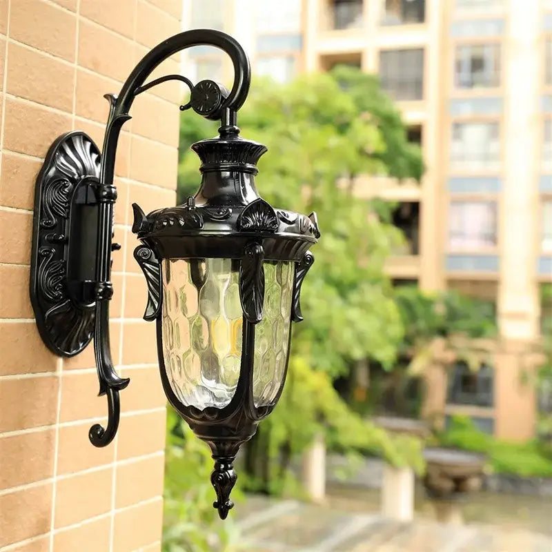 Classical bronze led outdoor wall lamp with black wrought iron frame and textured honeycomb glass panels decorbites bronze led wall lamp