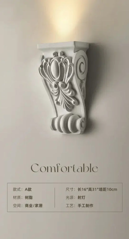White ornate cream resin wall lamp corbel with intricate floral scrollwork for elegant decorbites cream resin decor