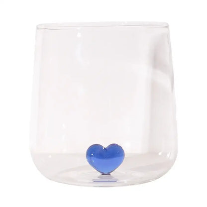 Clear glass tumbler mug with a glossy blue decorbites 3d heart accent at the base ideal as a kitchen glassware gift