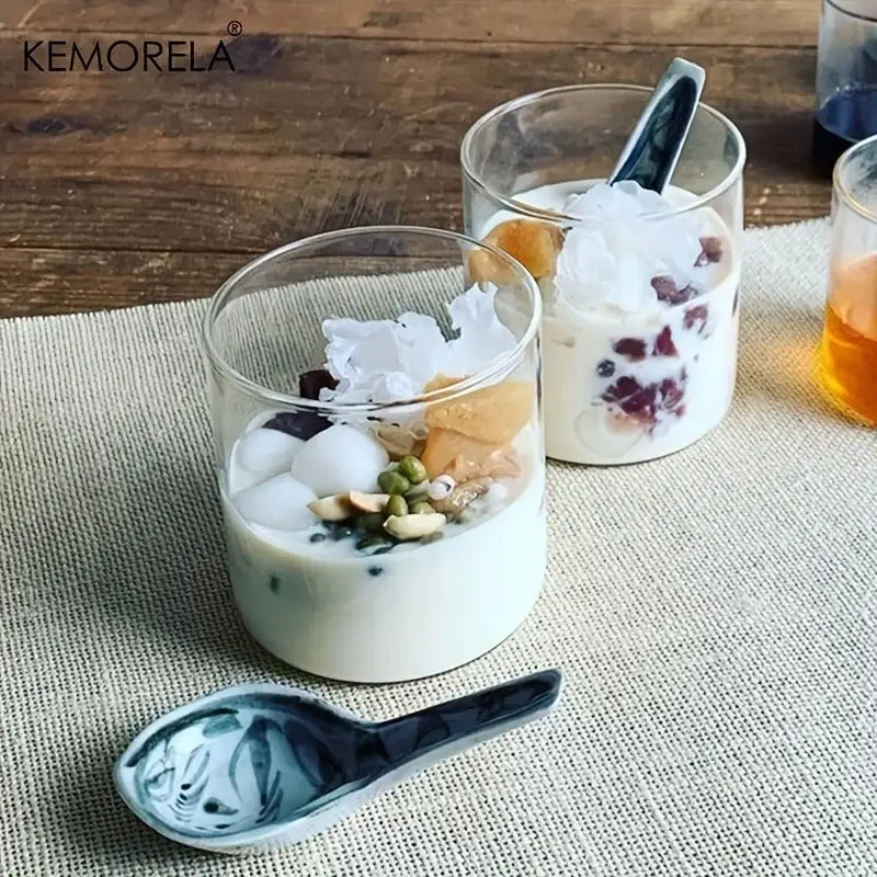 Kemorela ceramic spoon with blue and white hand-painted floral design paired with clear borosilicate drinking glasses set