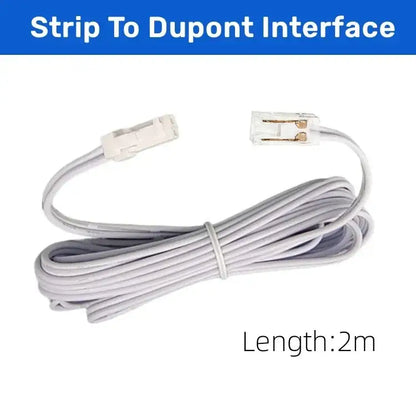 A 2-meter white coiled strip-to-dupont interface cable with clear plastic connectors for cob led strip use