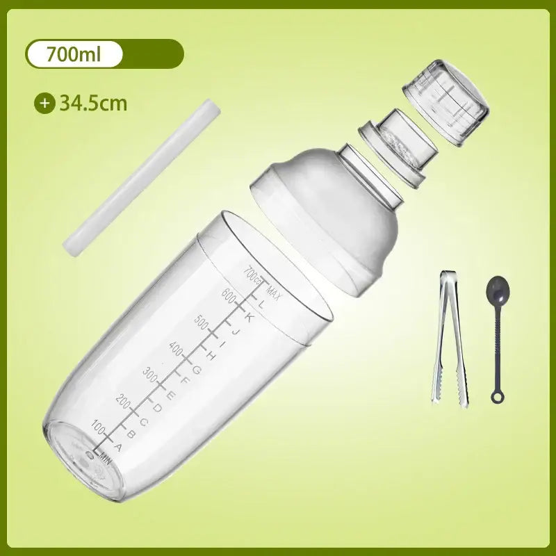Clear plastic cocktail shaker 700ml with graduated markings silver lid and included straw tongs and spoon for beverage mixer