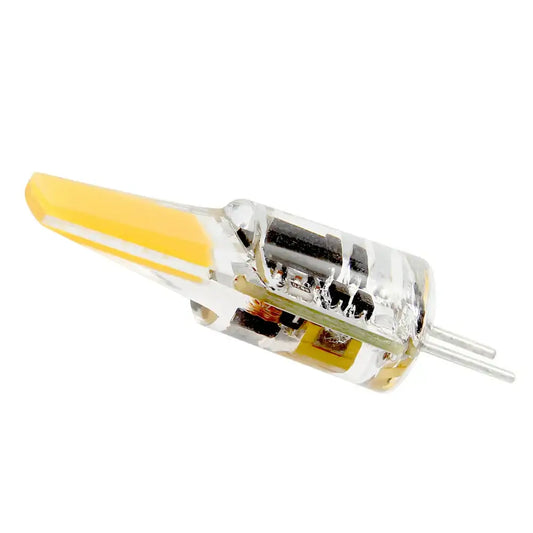 Clear glass dimmable g4 12v led bulb with yellow-tinted tip and two metallic pins for kitchen replacement lighting