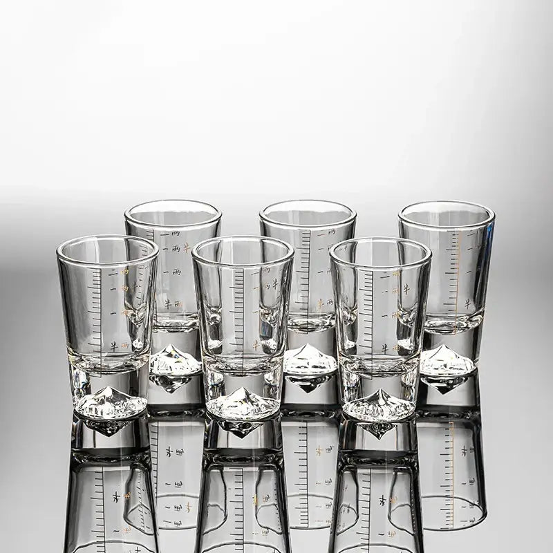 Clear glass liquor cup set with etched measurement markings and diamond bases from decorbites clear glass collection