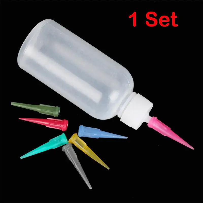 Clear plastic cake decor squeeze bottles with white cap and multicolor fine nozzles for kitchen use